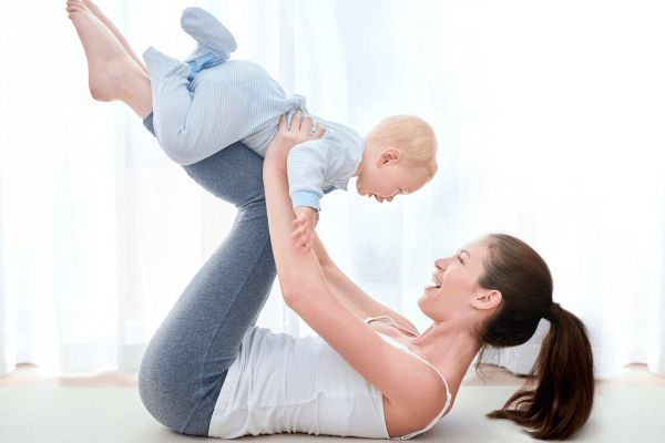 Mother Playing with Baby