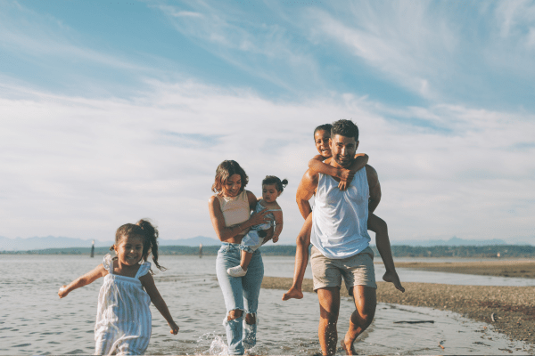 Family walking on the beach