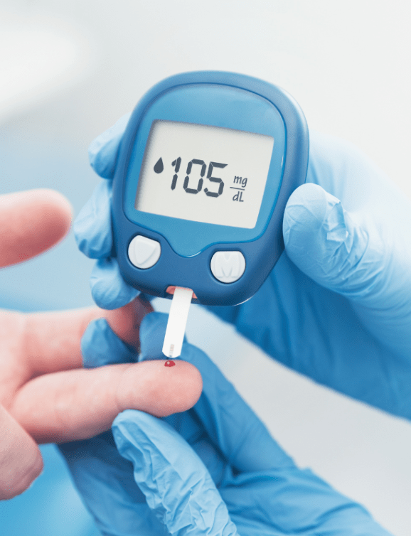 clinician helping patient with glucose monitor