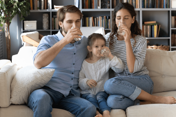 Family Drinking Water