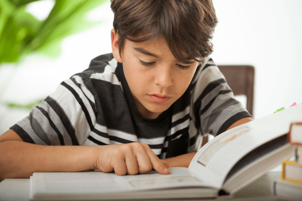 Child concentrating on reading