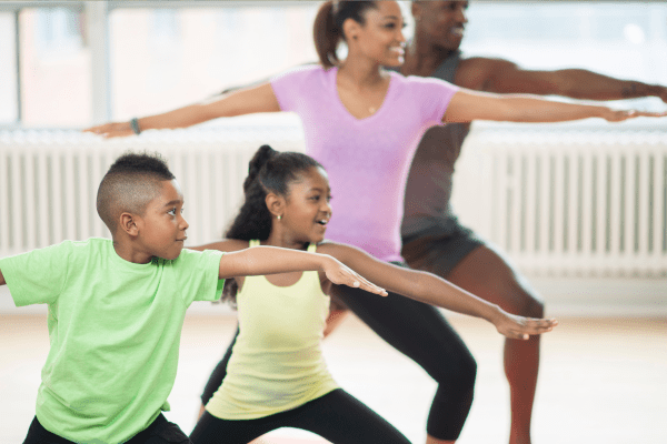 Family doing yoga together