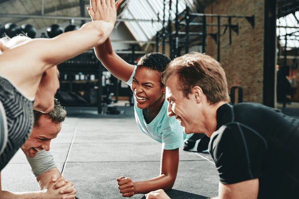 People laughing during workout