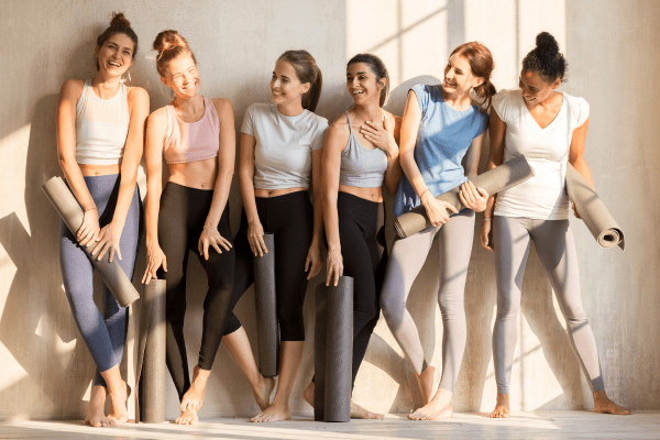 Women laughing at yoga class