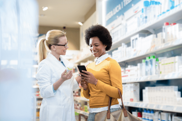 Member being helped by a pharmacist