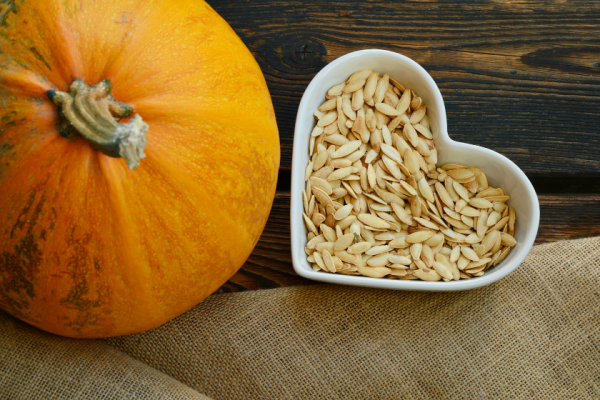 Pumpkin Seeds in a Heart Bowl