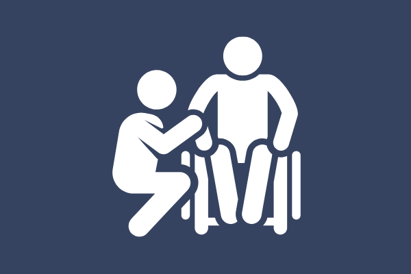 Someone helping person in a wheelchair